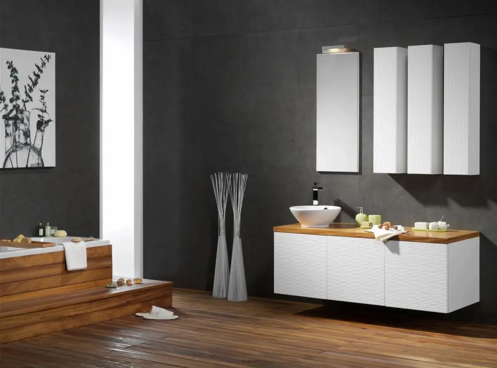 bathroom moller builders black walls white and wooden vanities