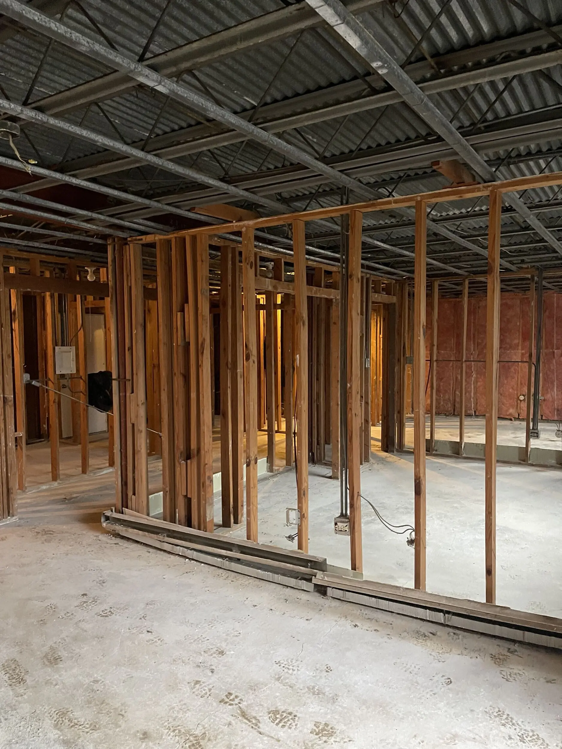 Interior partition walls stripped to wood studs