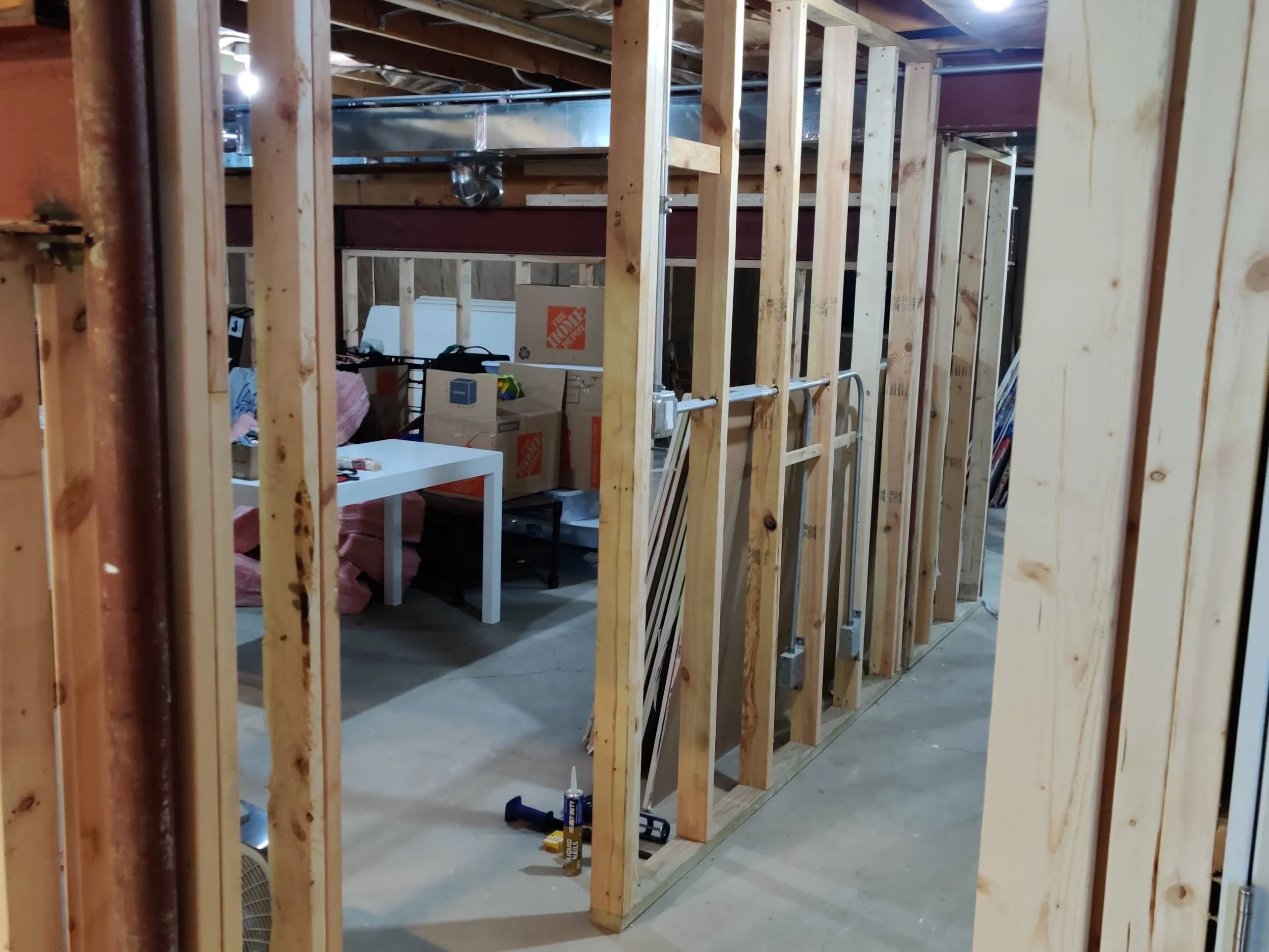 Basement closet and corridor framed with new studs during an Evanston remodel